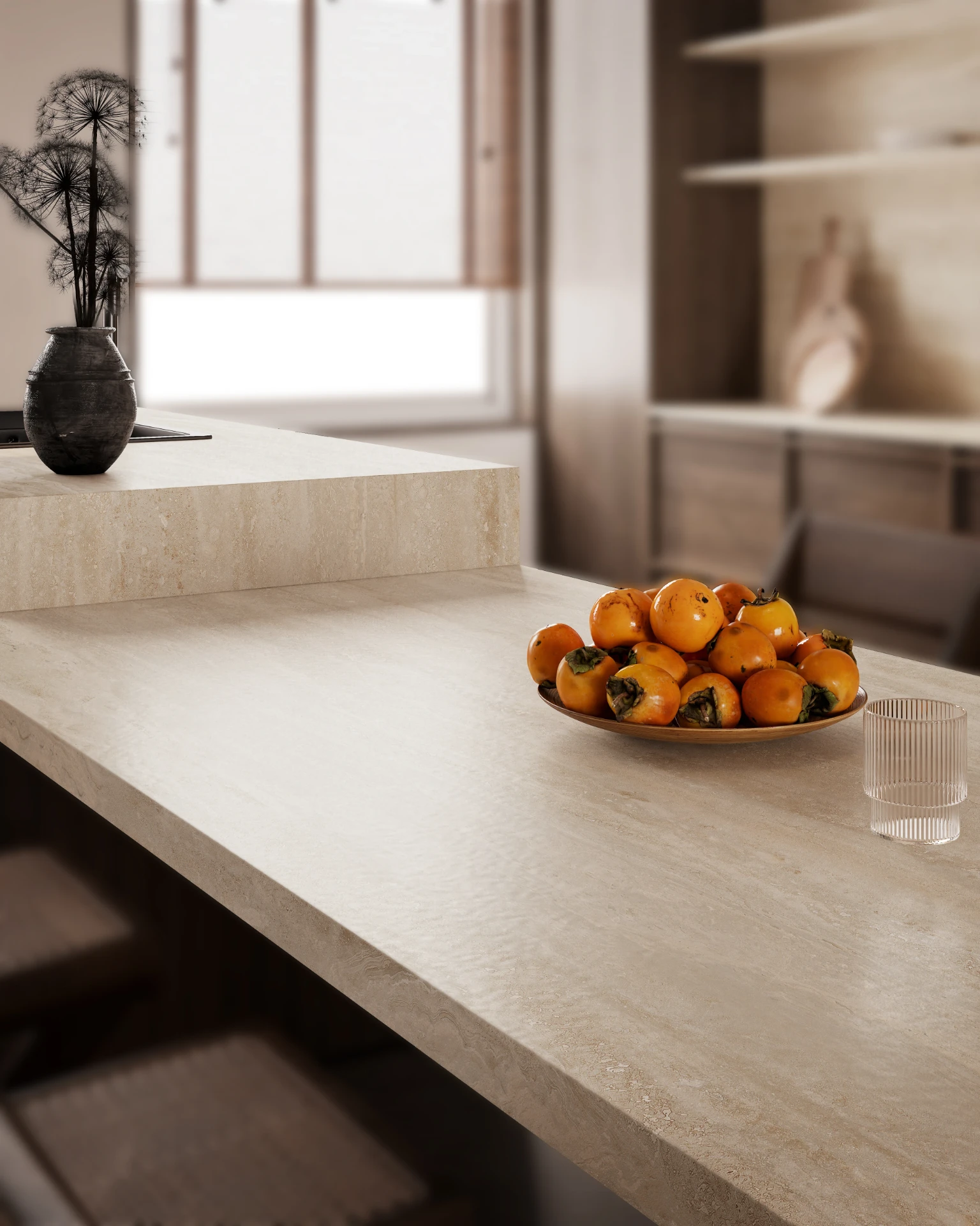 Warm travertine-toned porcelain worktop in soft daylight